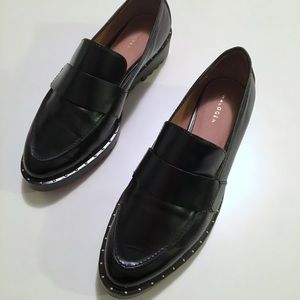 Black leather loafers